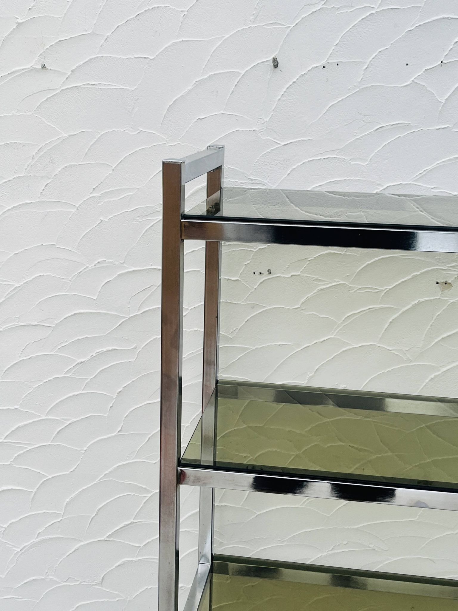 Vintage Italian design shelf in chrome and smoked glass from the 1970s.