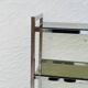 Vintage Italian design shelf in chrome and smoked glass from the 1970s.