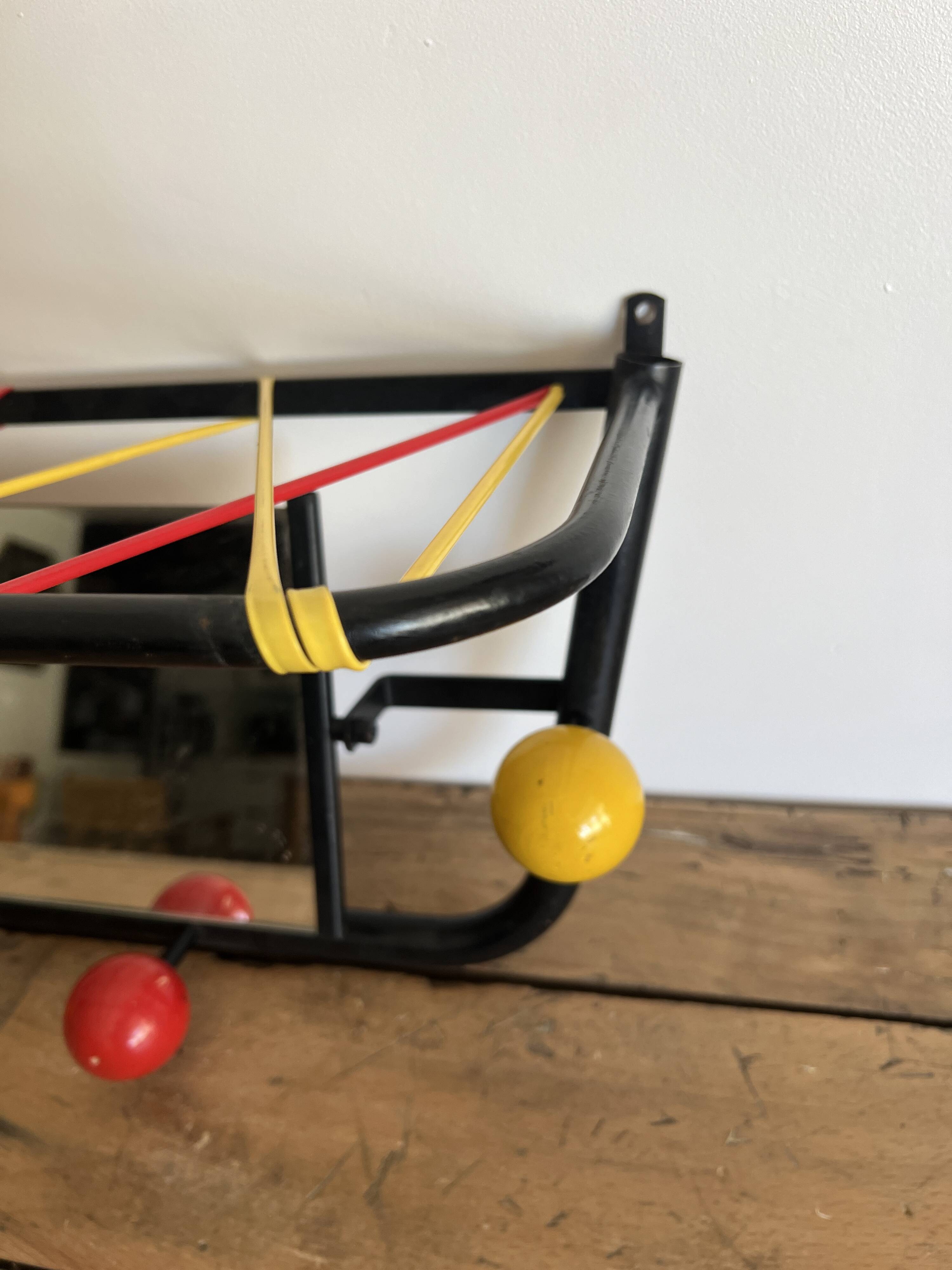 Vintage coat rack from the 1960s.