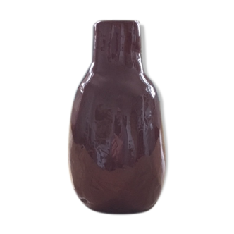 Bottle of chocolate brutalist vase