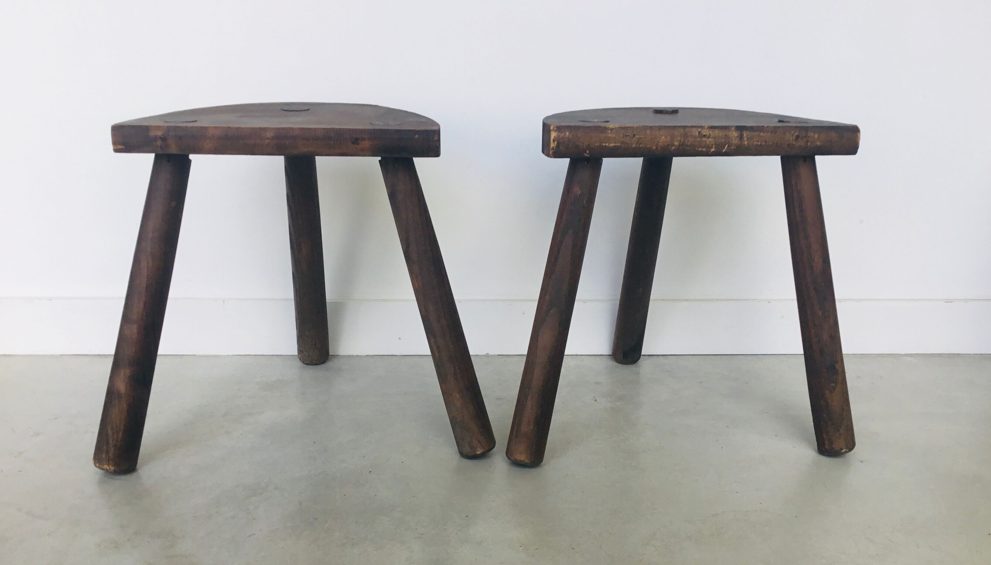 Pair of vintage tripod farm stools