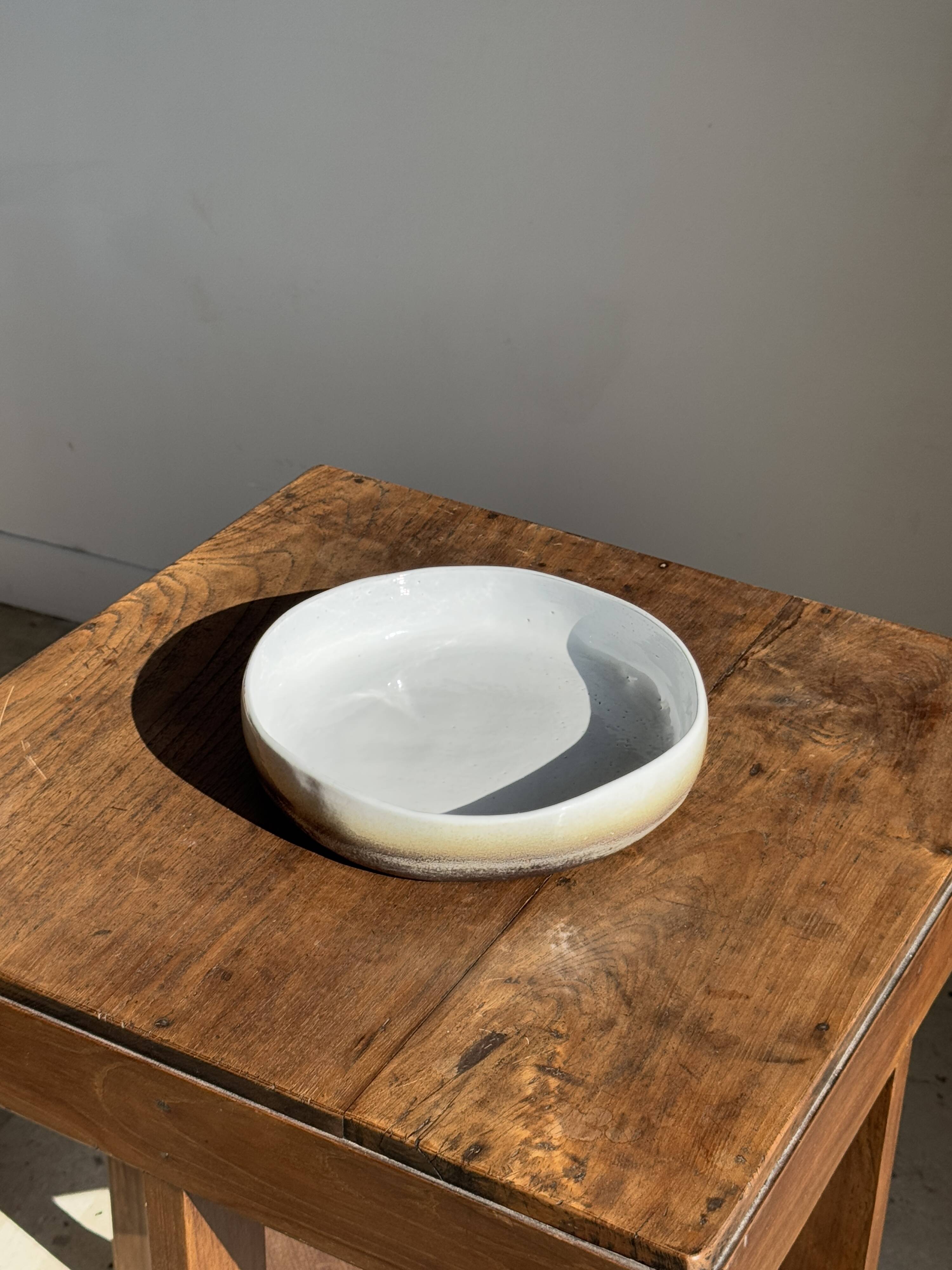 Large white and earthenware ceramic dish