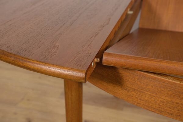 Table à manger ronde extensible en teck du milieu du siècle, Royaume-Uni, années 1960