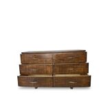 A vintage Italian chest of drawers, made of veneered walnut and solid wood,