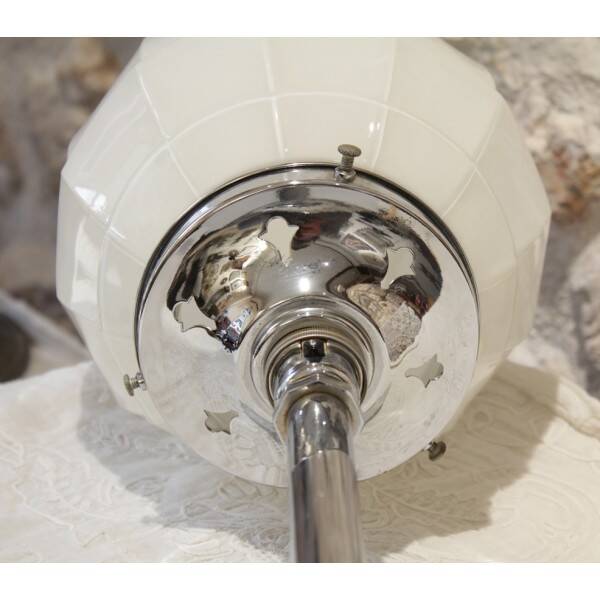 Chrome metal lamp with glass globe, Art Deco style, 20th century period.