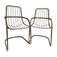 Pair of Willy Rizzo armchairs in gold metal