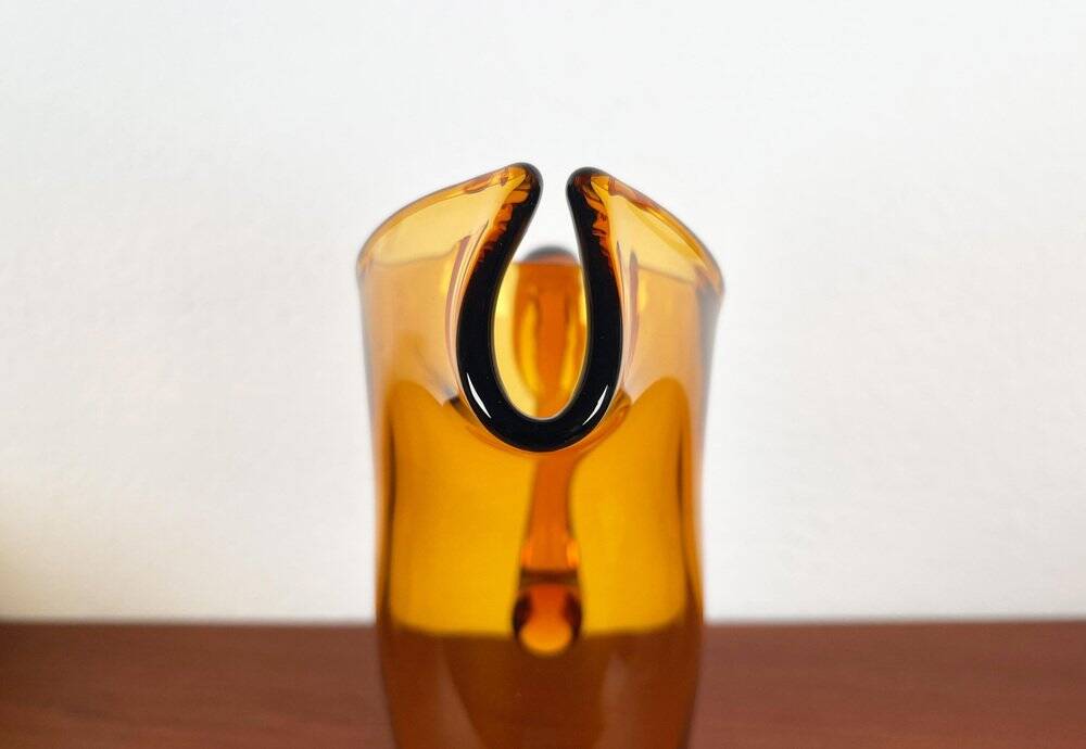 Amber glass carafe from the mid-century German Jagdhaus series and drinking glasses by Wilhelm Braun-Feldweg for Hirschberg, 1960s, set of 7.