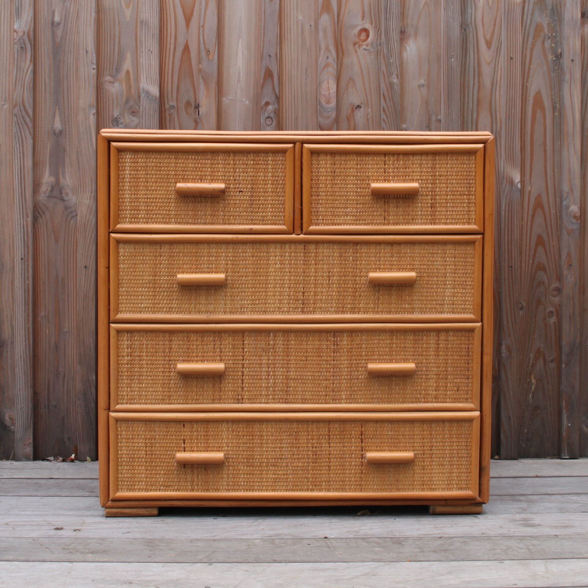 Wooden chest of drawers and rattan