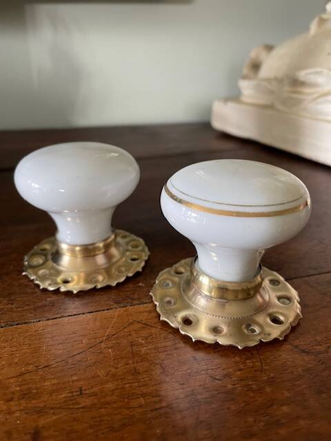 pair of round porcelain and copper Art Deco handles