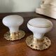 pair of round porcelain and copper Art Deco handles