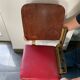 Strapontin armchair showroom