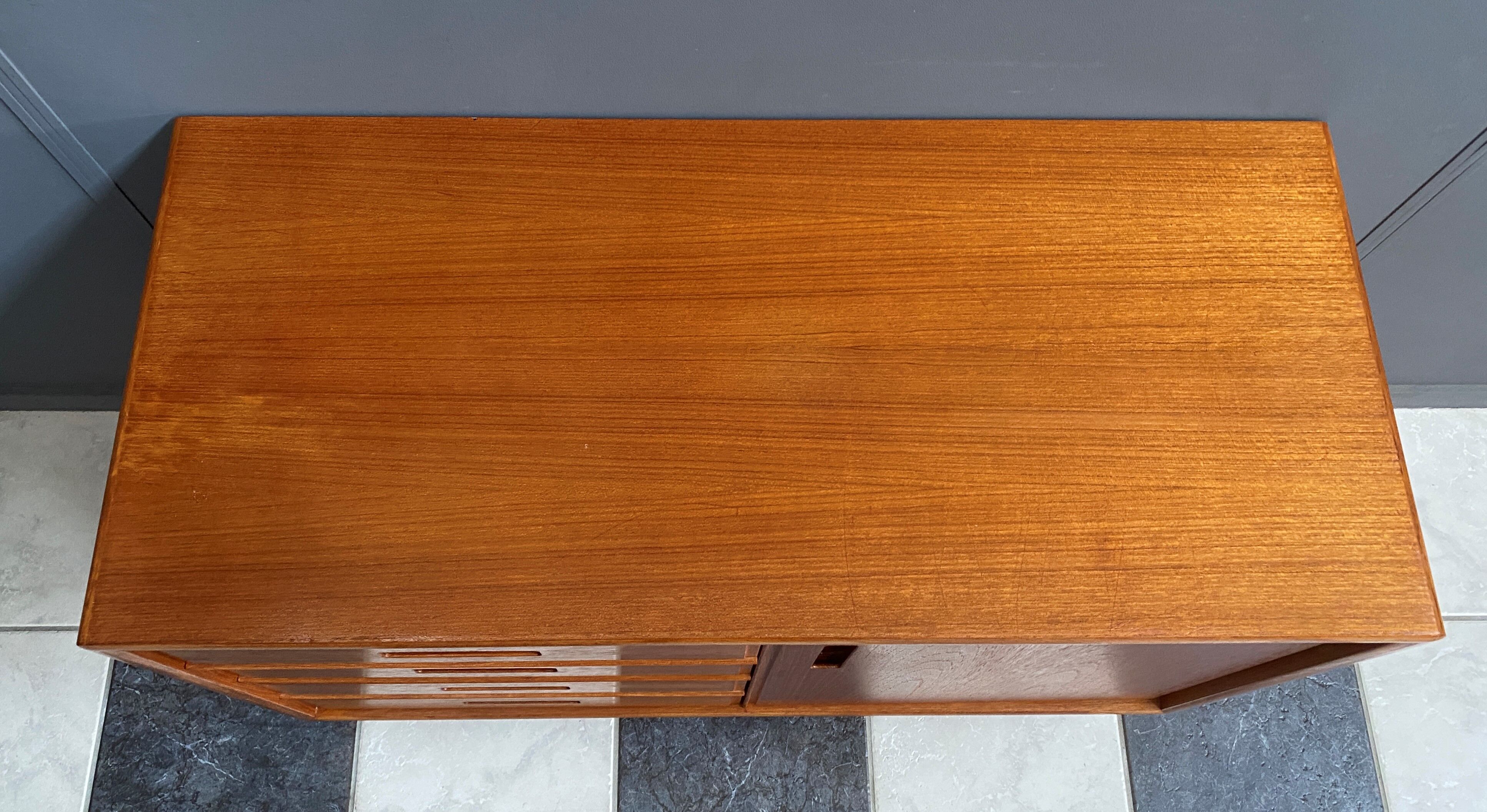 Danish Teak sideboard with drawers and door, 1960s