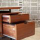 Mahogany veneer desk by Pierre Guariche for Minvielle, 1950s