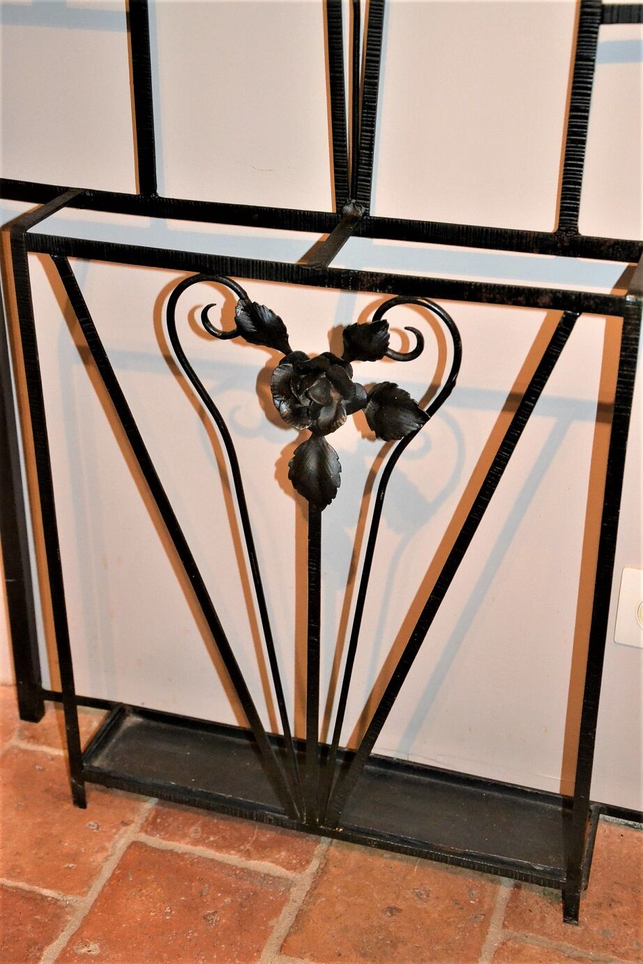 Wrought iron coat rack