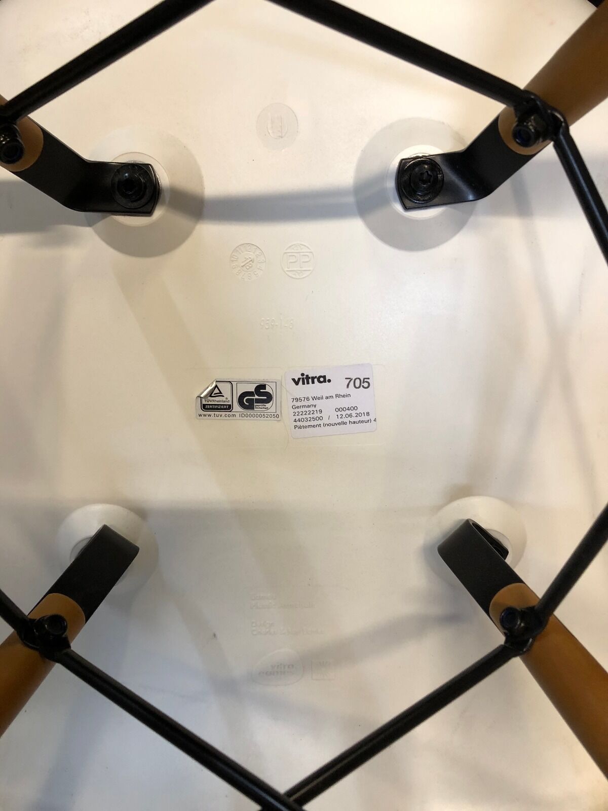 White DAW armchair by Charles & Ray Eames