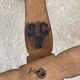 Wall-mounted accordion coat rack made of turned wood