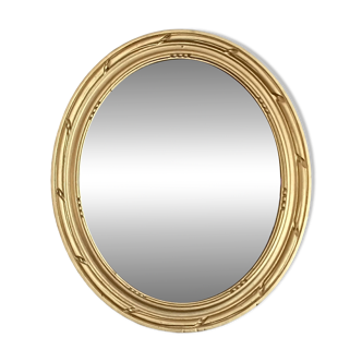 Oval gold mirror