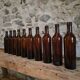 Set of 10 bottles of old Bordeaux French wine in ruby brown glass, 19th century.