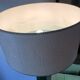 Retro table lamp with glass base and crocodile effect leather shade.
