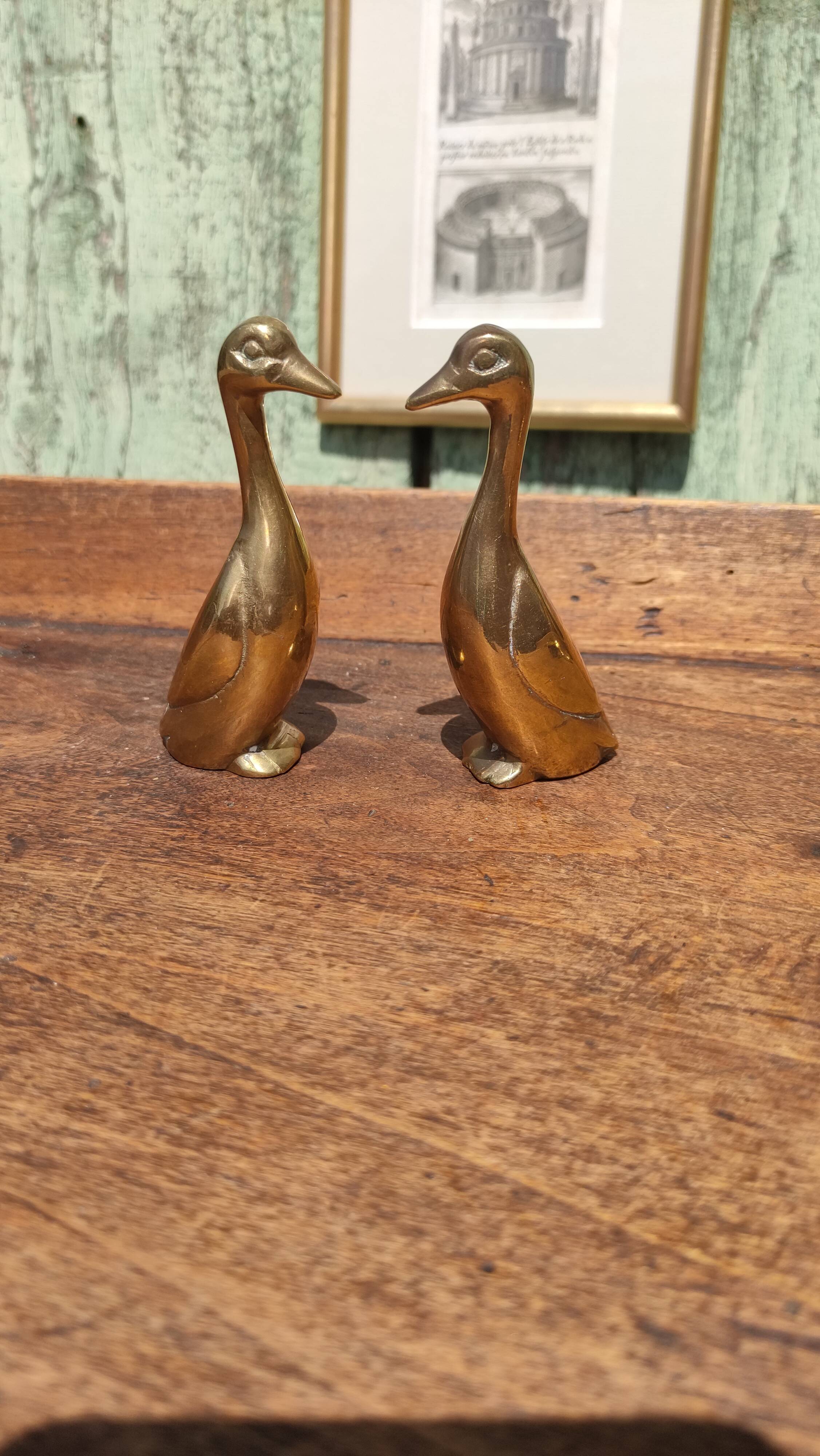 Pair of golden brass ducks