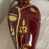 Vintage 1970 red and gold ceramic lamp with oriental decorations.