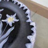 Black ceramic plate from the 60s