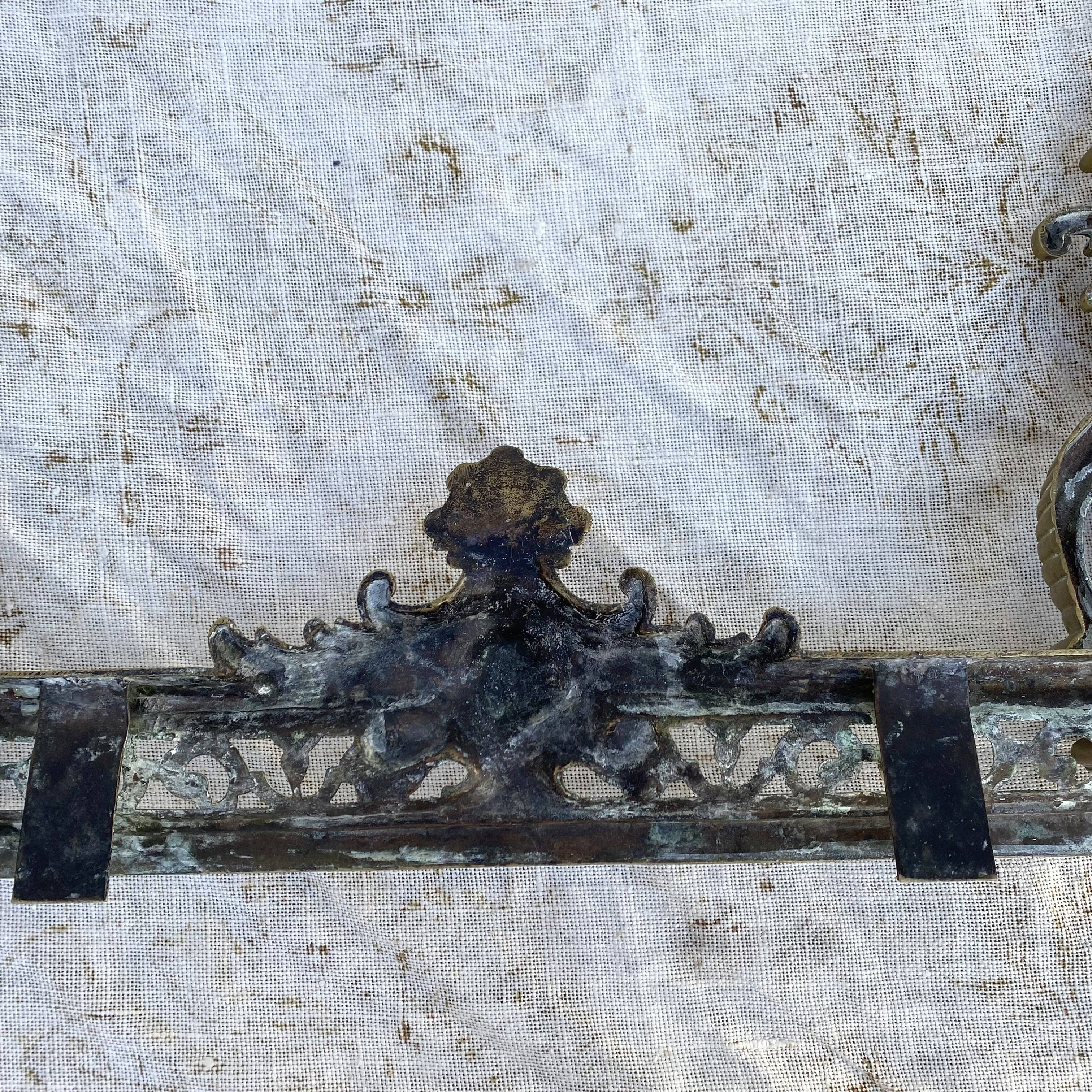 Antique brass fireplace set, bar and andirons, Napoleon I style.