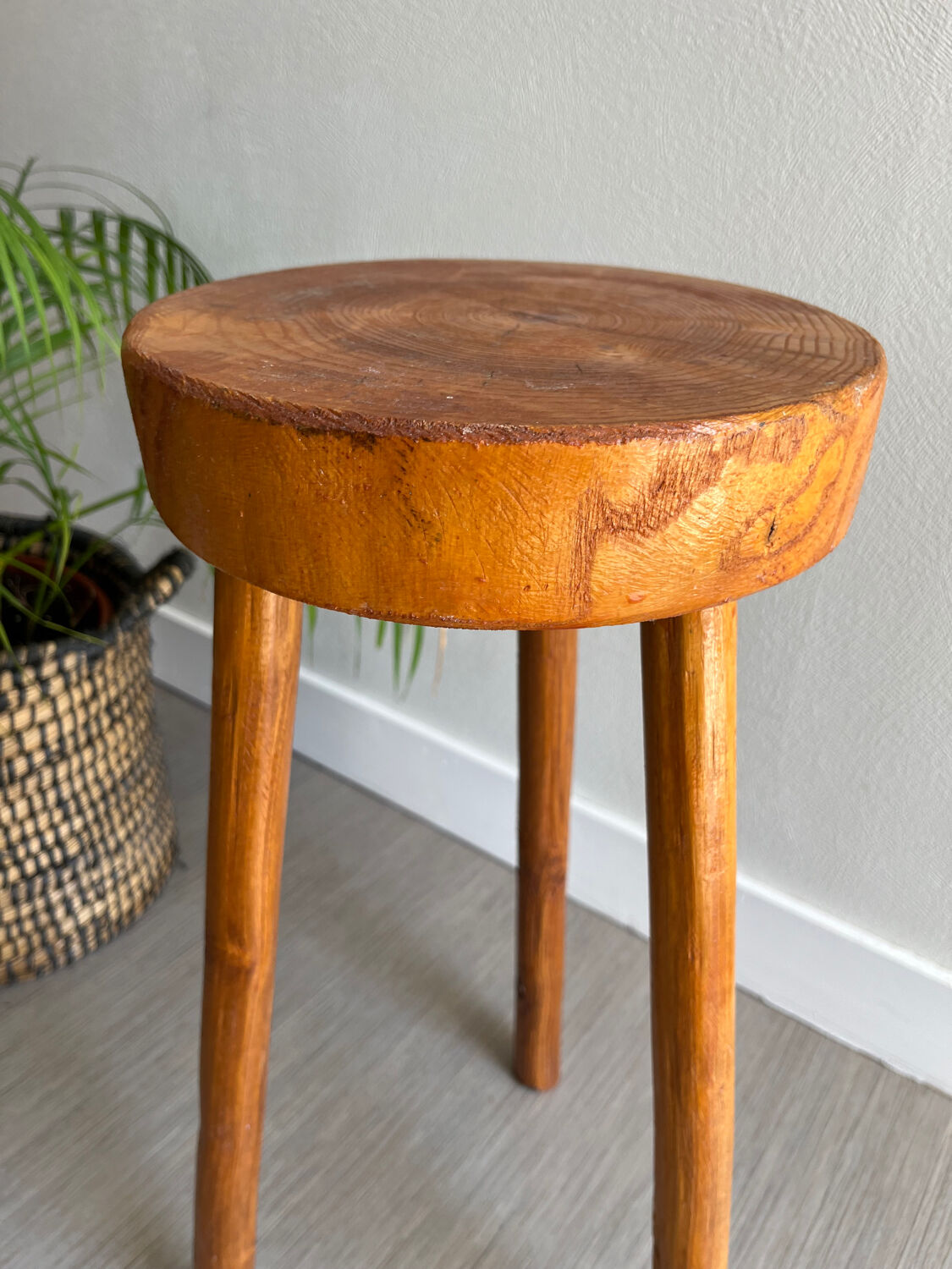 Tripod stool in a brutalist style
