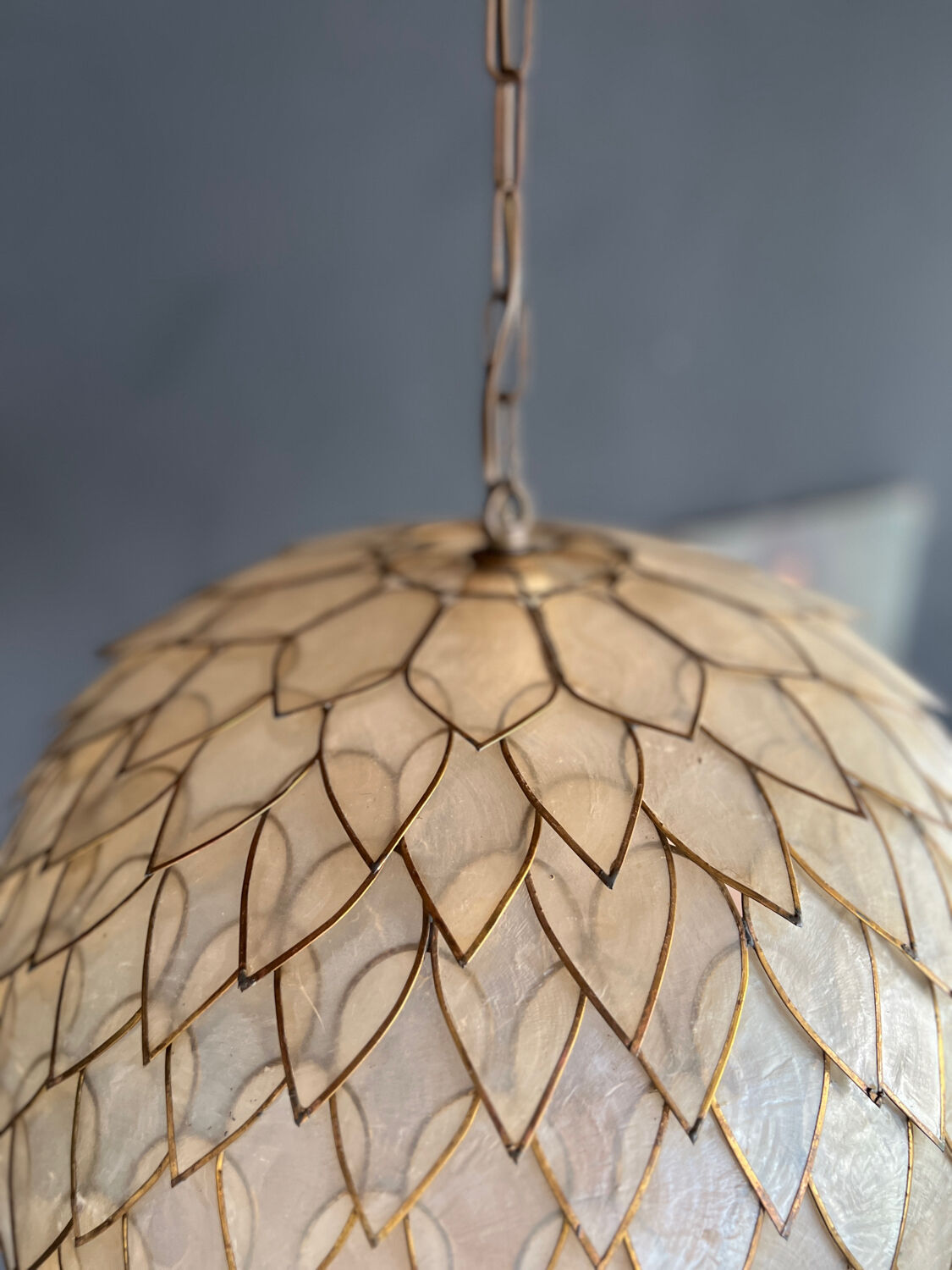 Brass and mother-of-pearl suspension