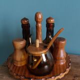 Oil, vinegar, mustard, pepper, salt, olive wood servant from Spain.
