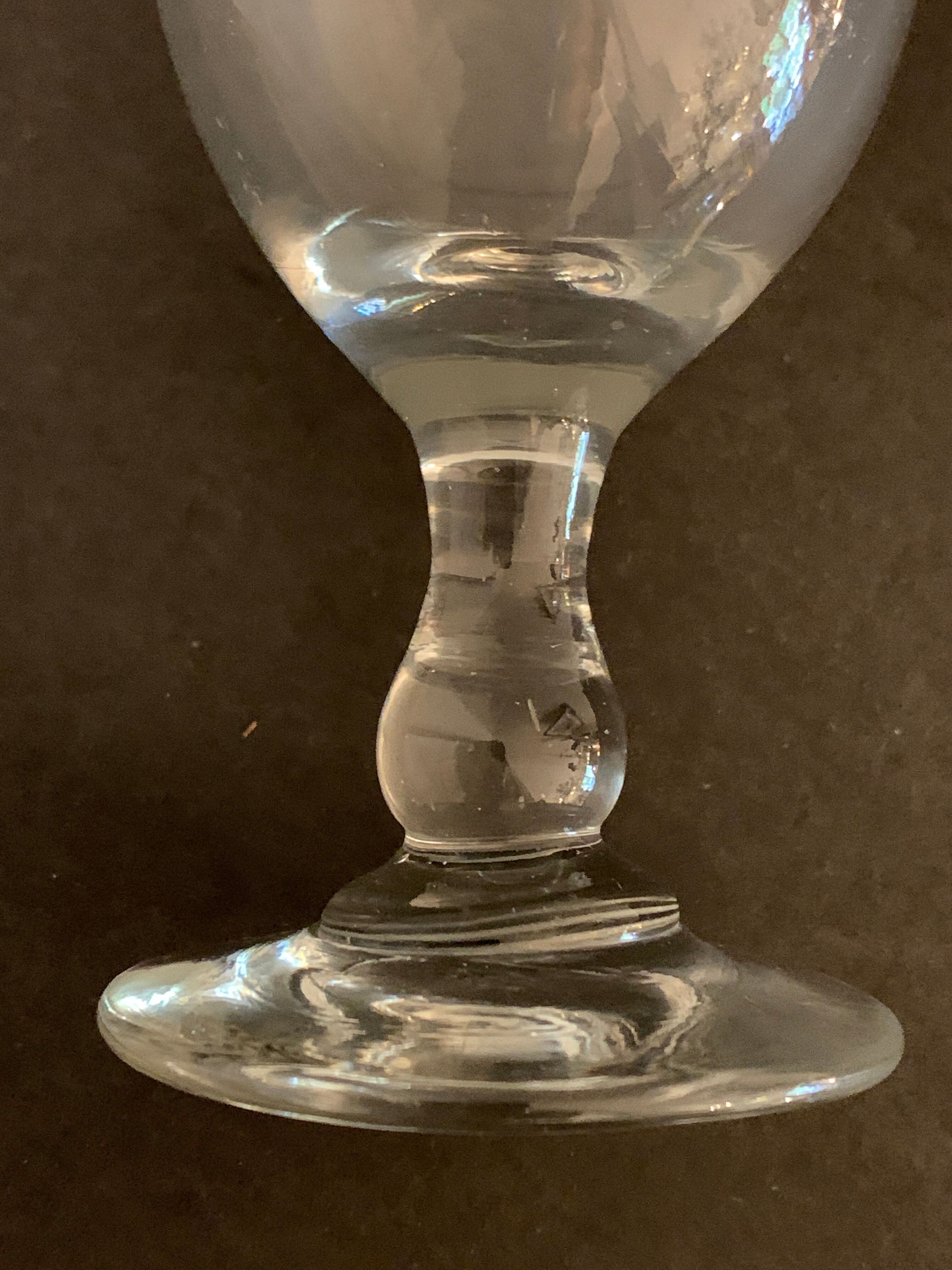 7 antique blown foot glasses