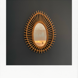 Vintage rattan sun mirror