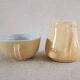 Earthenware cup and milk jar