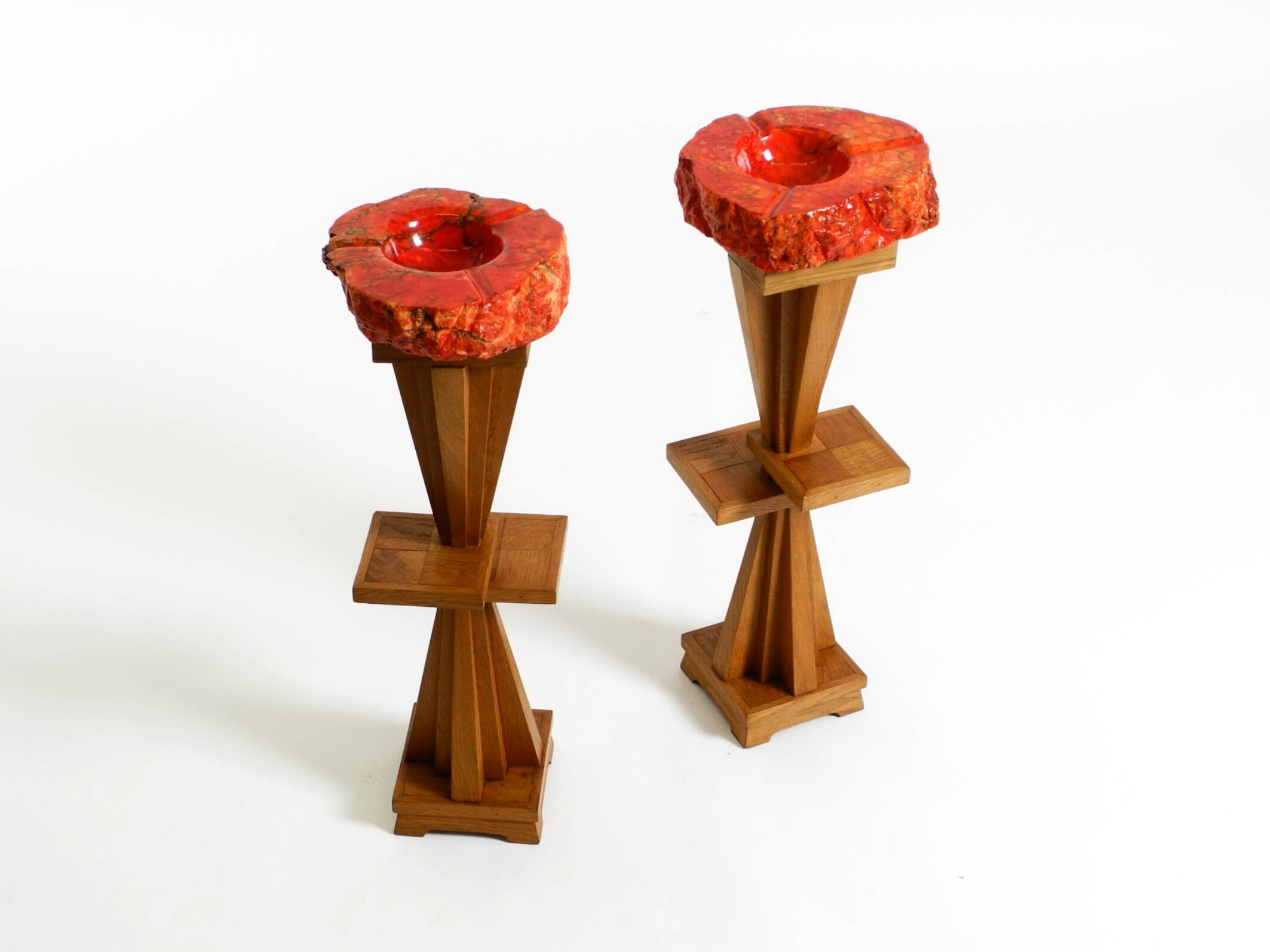 Two mid-century standing ashtrays consisting of red Alabaster cup