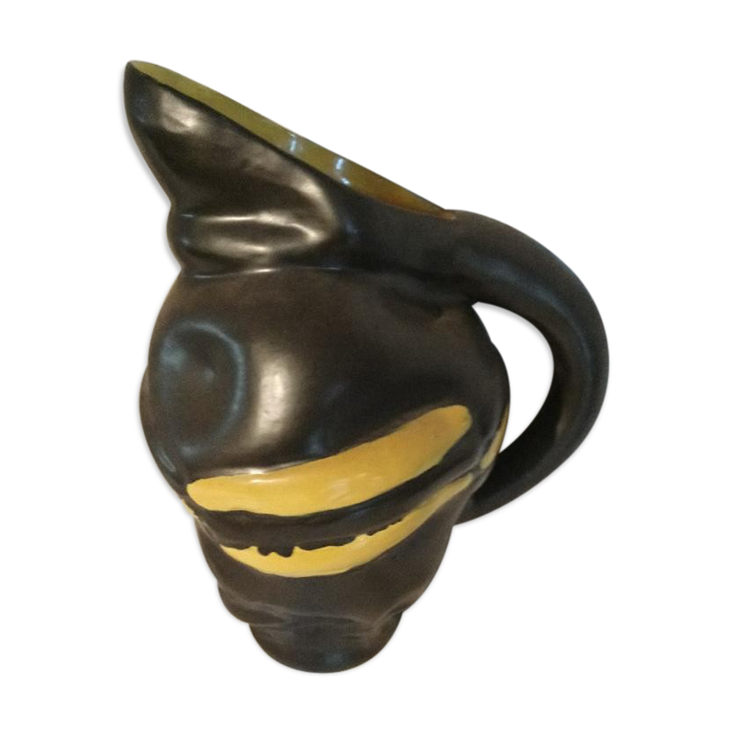 Yellow and Black ceramic pitcher
