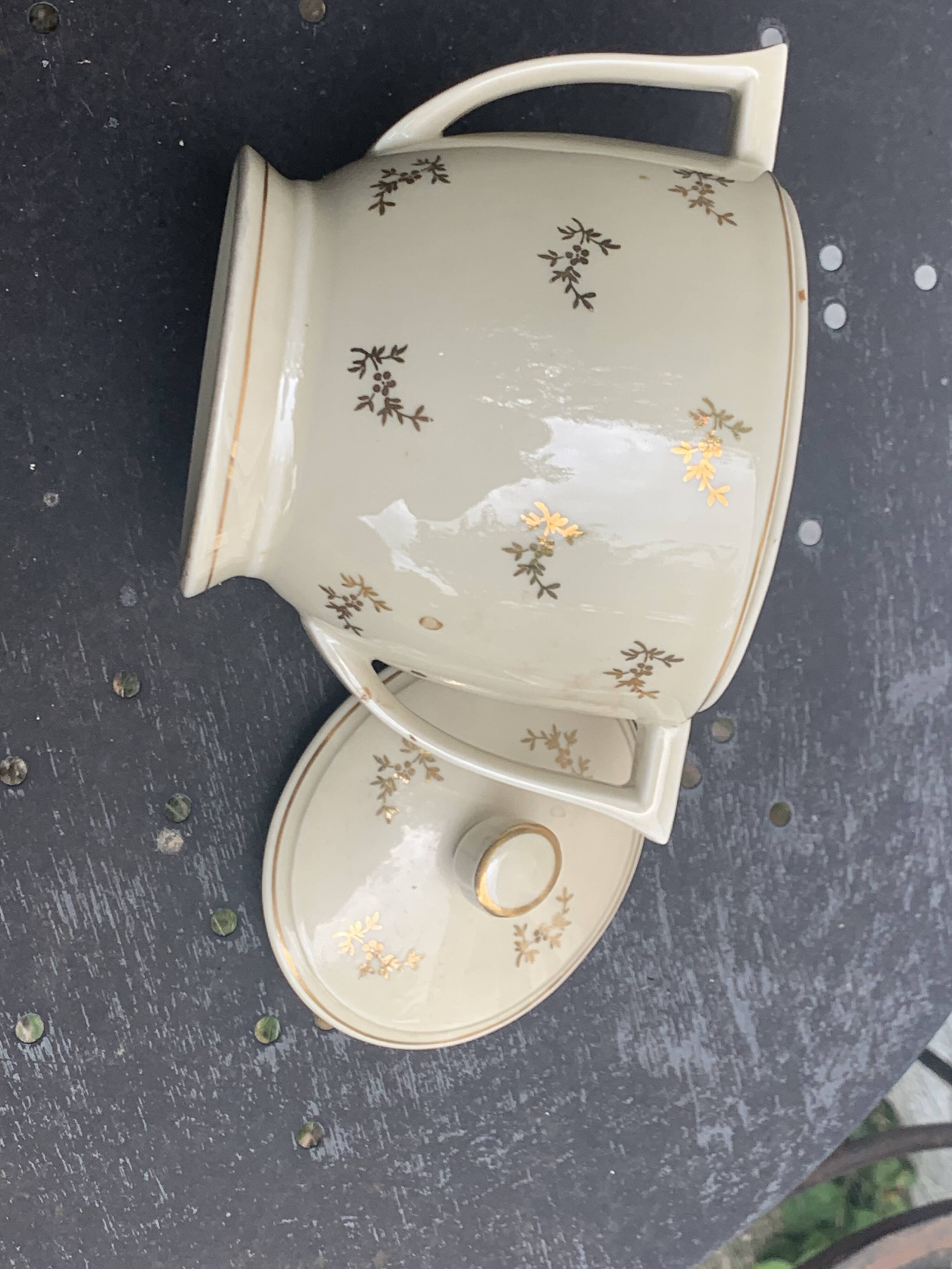 Antique porcelain sugar bowl and milk jug from the Royal Factory of Limoges, France