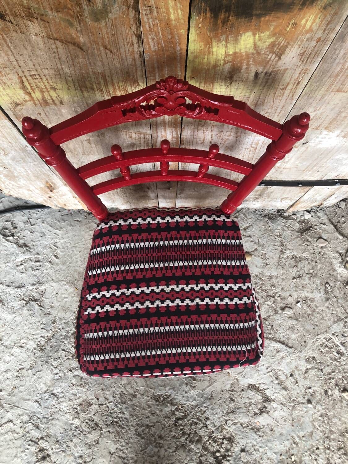 Red carved wood bedroom chair & vintage striped fabric seat