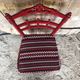 Red carved wood bedroom chair & vintage striped fabric seat