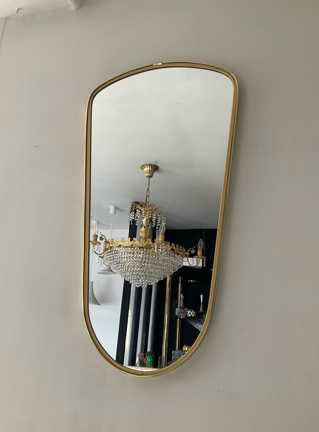 Asymmetrical free-form mirror from the 70s