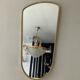 Asymmetrical free-form mirror from the 70s