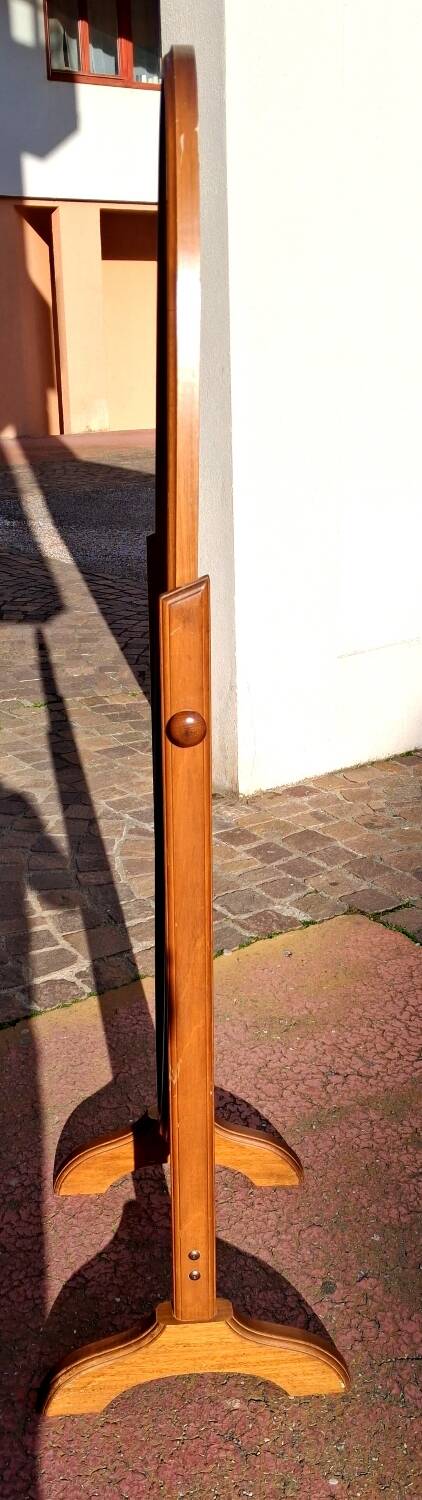 Adjustable full-length mirror for dressing room.