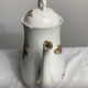 Antique porcelain teapot and sugar bowl