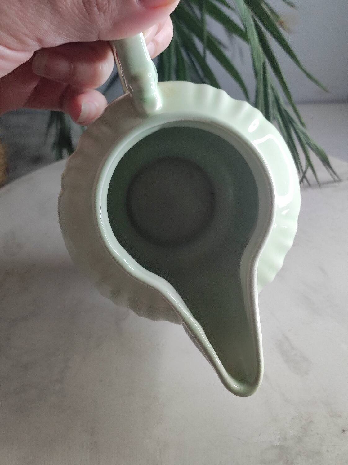 Green ceramic milk jug