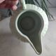 Green ceramic milk jug