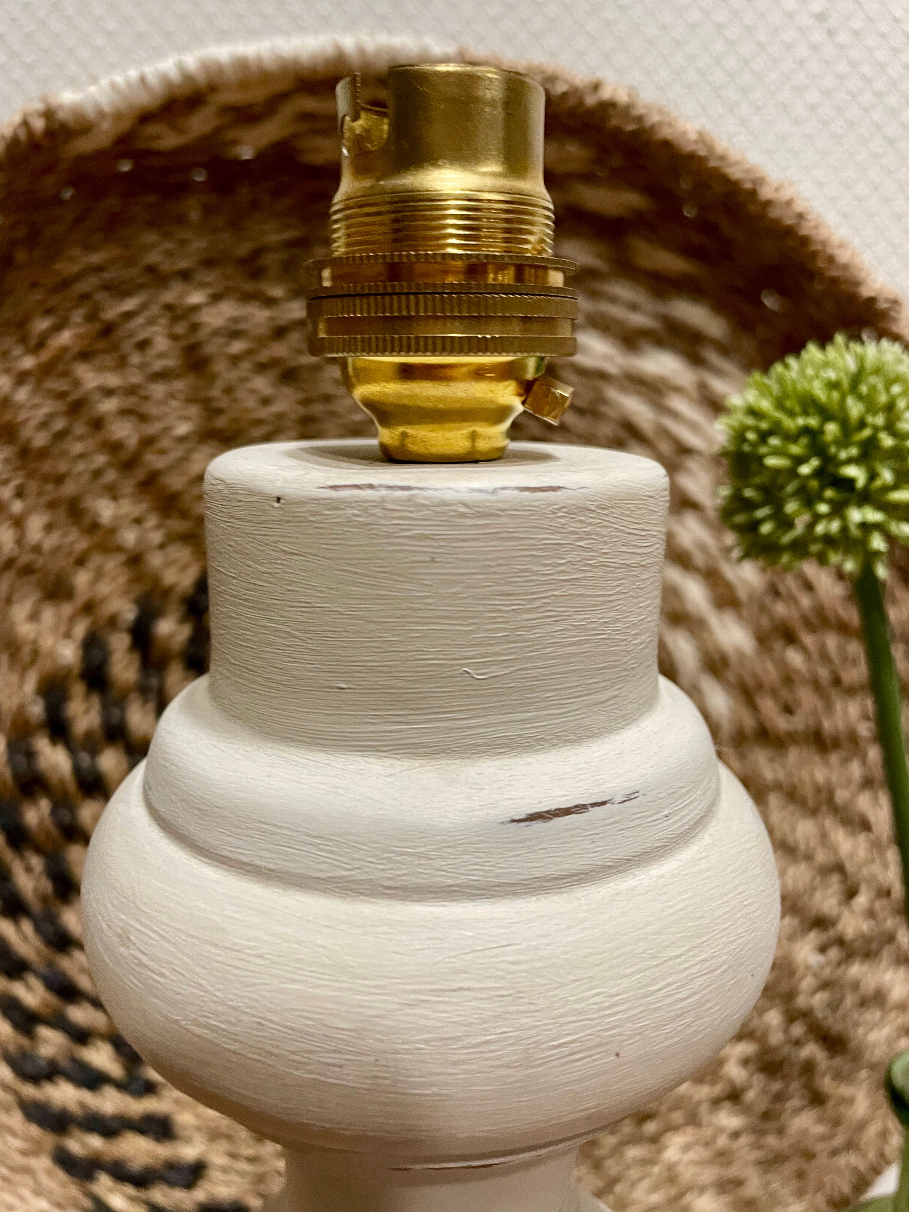 Old lamp foot patinated tinted linen