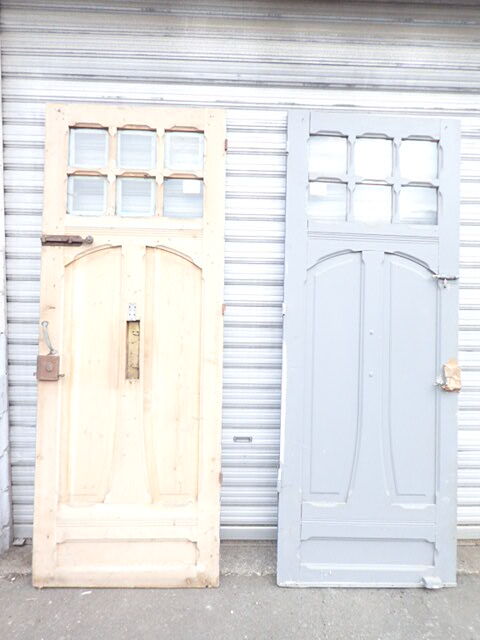 Double front door, fir and windows at the top
