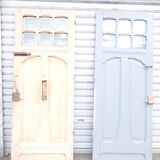 Double front door, fir and windows at the top