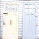 Double front door, fir and windows at the top