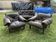 Set of 3 armchairs and a Mid-Century brown leather and black wood tufted sofa (1960s)