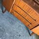 Vintage 1950s brown wooden dressing table with a double mirror and integrated storage.